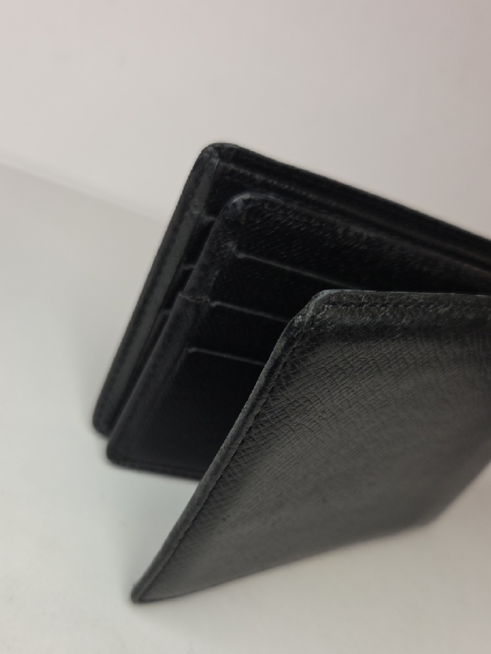 Louis Vuitton Black Taiga Textured Leather Slim Wallet - Picture 7 of 11